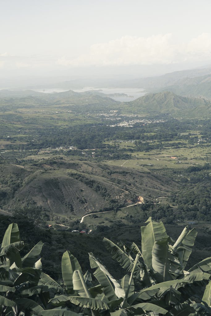 Captivating aerial view of lush green valleys and mountains in Huila, Colombia.